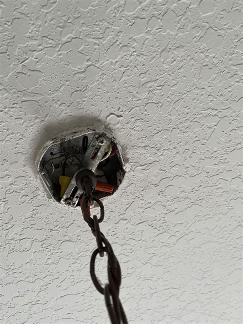 electrical box sticking out of ceiling